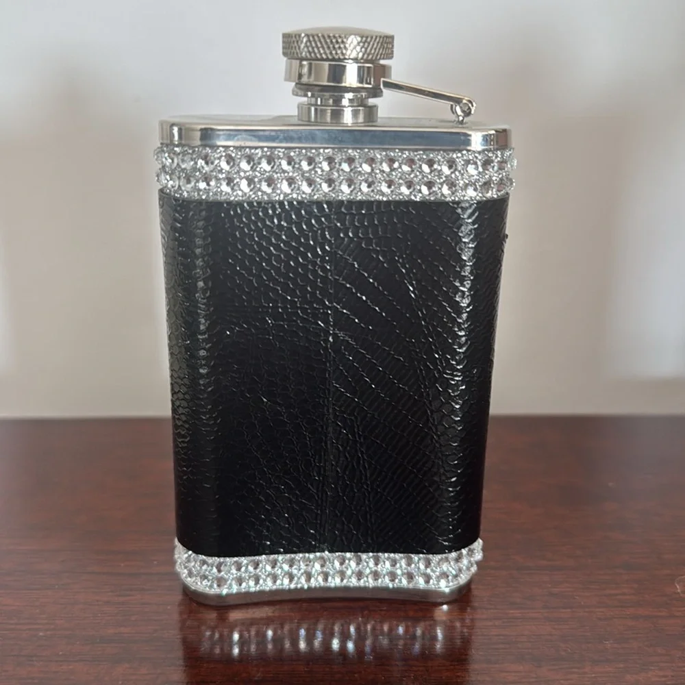 2 stainless steel flasks. Peace sign with rhinestones from ZGallerie.